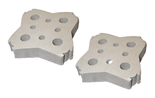 Two metallic cutting tools with a star-shaped design on a white background