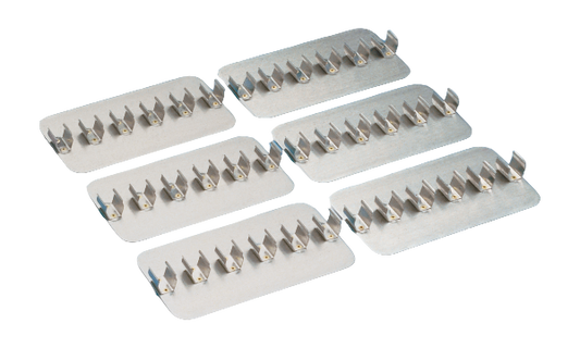 Set of metal brackets on a white background