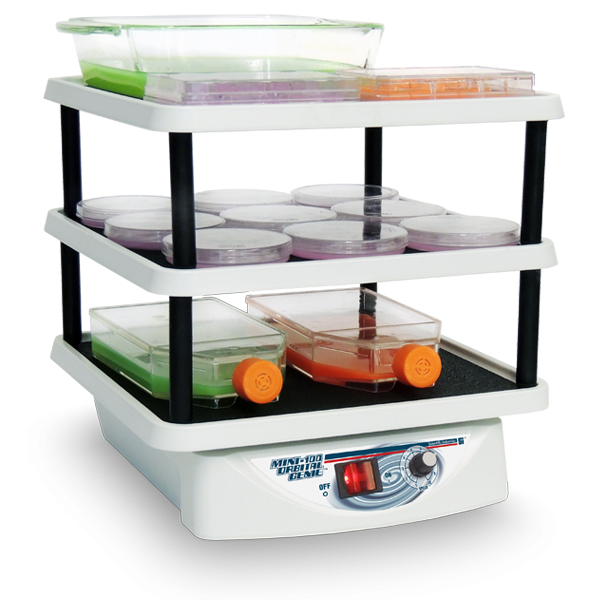 Three-tiered incubator with various containers on a white background